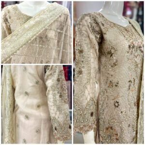 Ivory beige embroidered Pakistani formal 3 piece suit with dupatta on female model