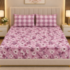 Pink mauve floral printed bedsheet set with matching pillow covers.