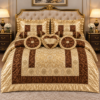 Luxury imported silk 9-piece comforter set in elegant gold and brown color combination featuring embroidered detailing, matching pillow covers, decorative cushions, neck rolls, and heart-shaped cushion displayed on a premium bedroom bed.