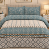 Teal and cream printed bed sheet set with paisley and geometric patterns on a luxury bed