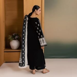 Elegant black embroidered printed 3-piece linen suit featuring intricate white embroidery on the shirt, matching dupatta, and coordinated trousers.