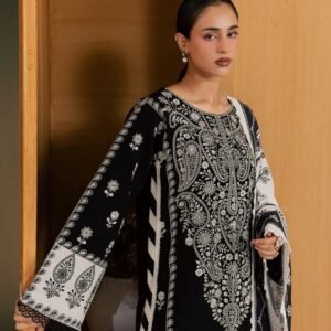 Elegant black embroidered printed 3-piece linen suit featuring intricate white embroidery on the shirt, matching dupatta, and coordinated trousers.