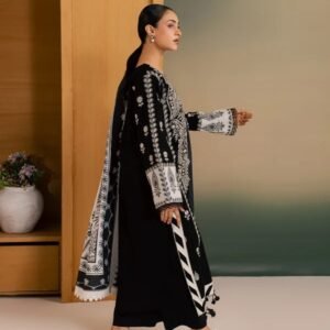 Elegant black embroidered printed 3-piece linen suit featuring intricate white embroidery on the shirt, matching dupatta, and coordinated trousers.