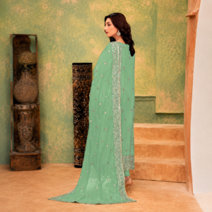 Luxury premium Tasal Silk handwork embroidered 3 piece Pakistani suit featuring heavy embroidery, embellished detailing, embroidered silk dupatta, and matching trouser.