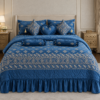 Leather laser cut 9-piece navy blue bed set featuring elegant decorative detailing and a luxurious bedroom design.